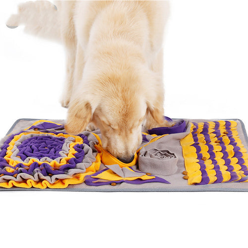 foraging fun mat for dogs with a golden retriever sniffing and exploring the colorful texture of the interactive mat.